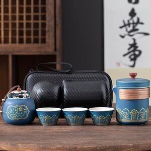 Blue and Gold Tea Set with Floral Design